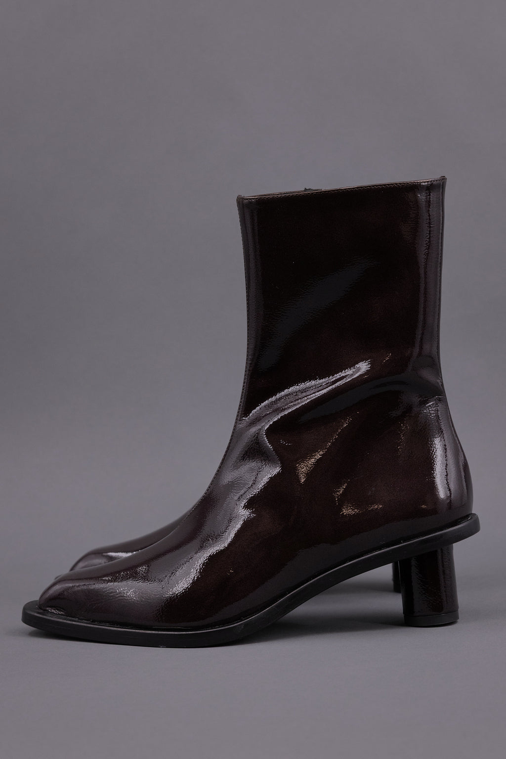 Gilda ankle booth in patent after dark