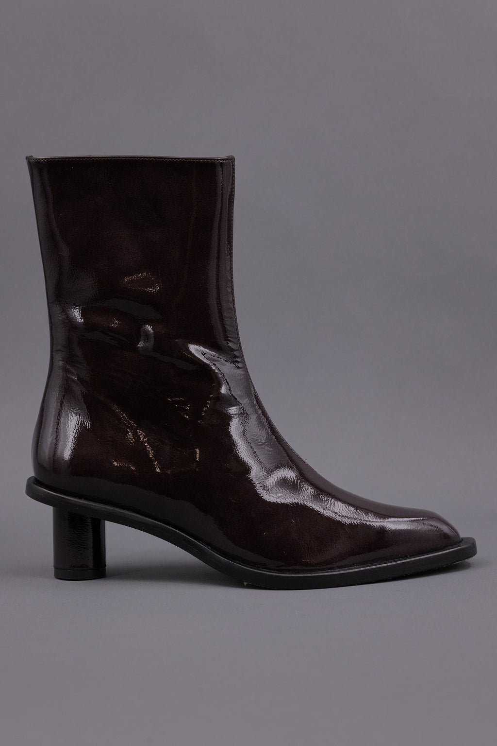Gilda ankle booth in patent after dark