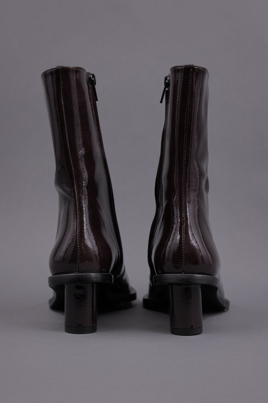 Gilda ankle booth in patent after dark