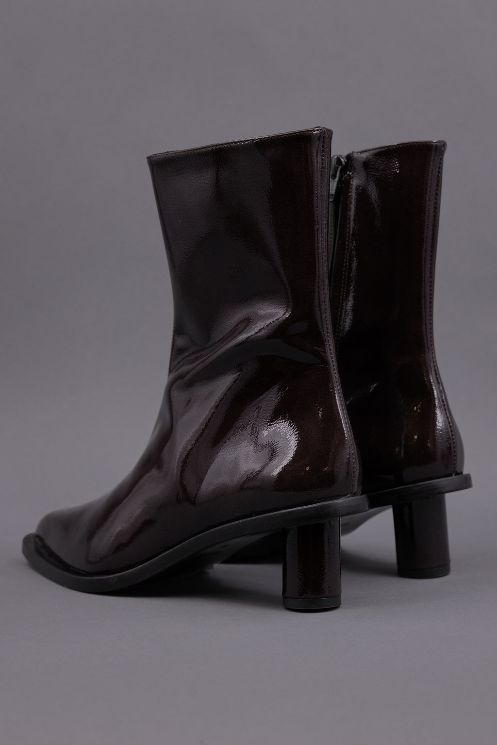 Gilda ankle booth in patent after dark