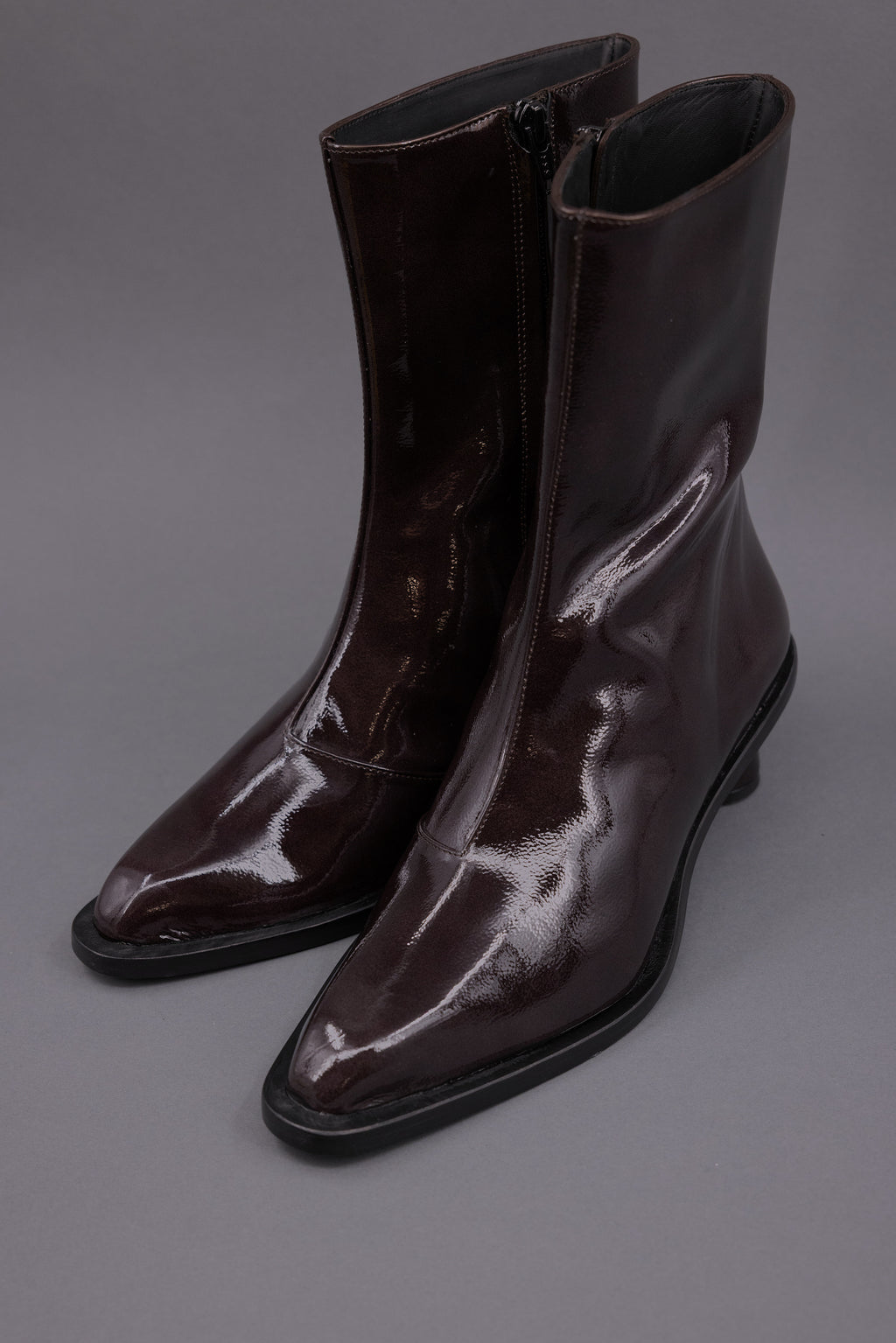 Gilda ankle booth in patent after dark