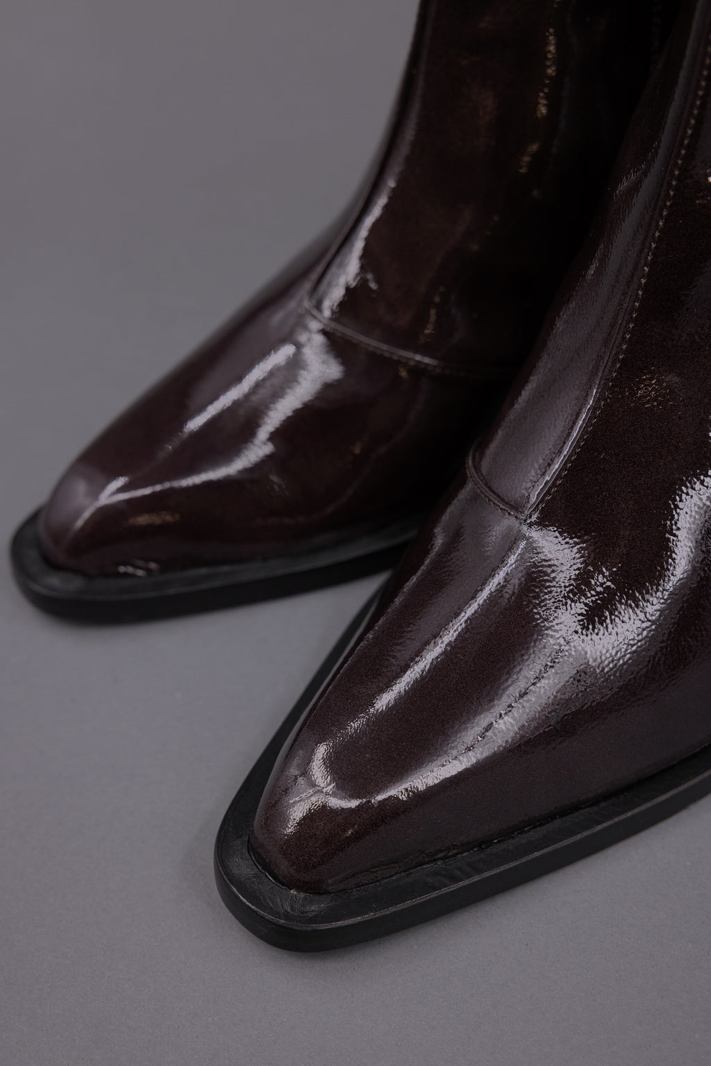 Gilda ankle booth in patent after dark