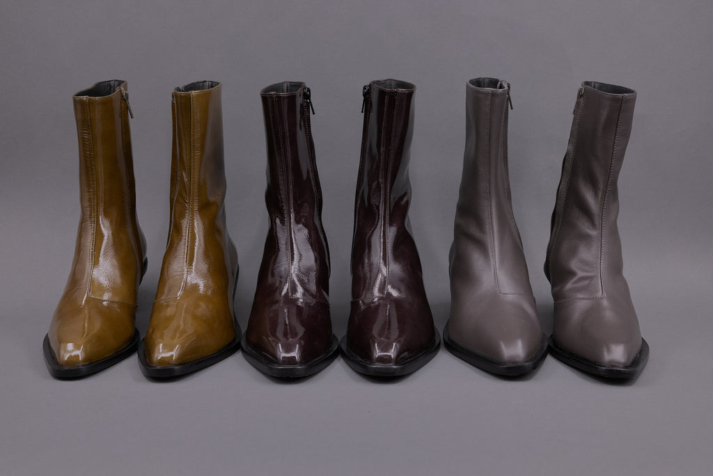 Gilda ankle booth in patent after dark