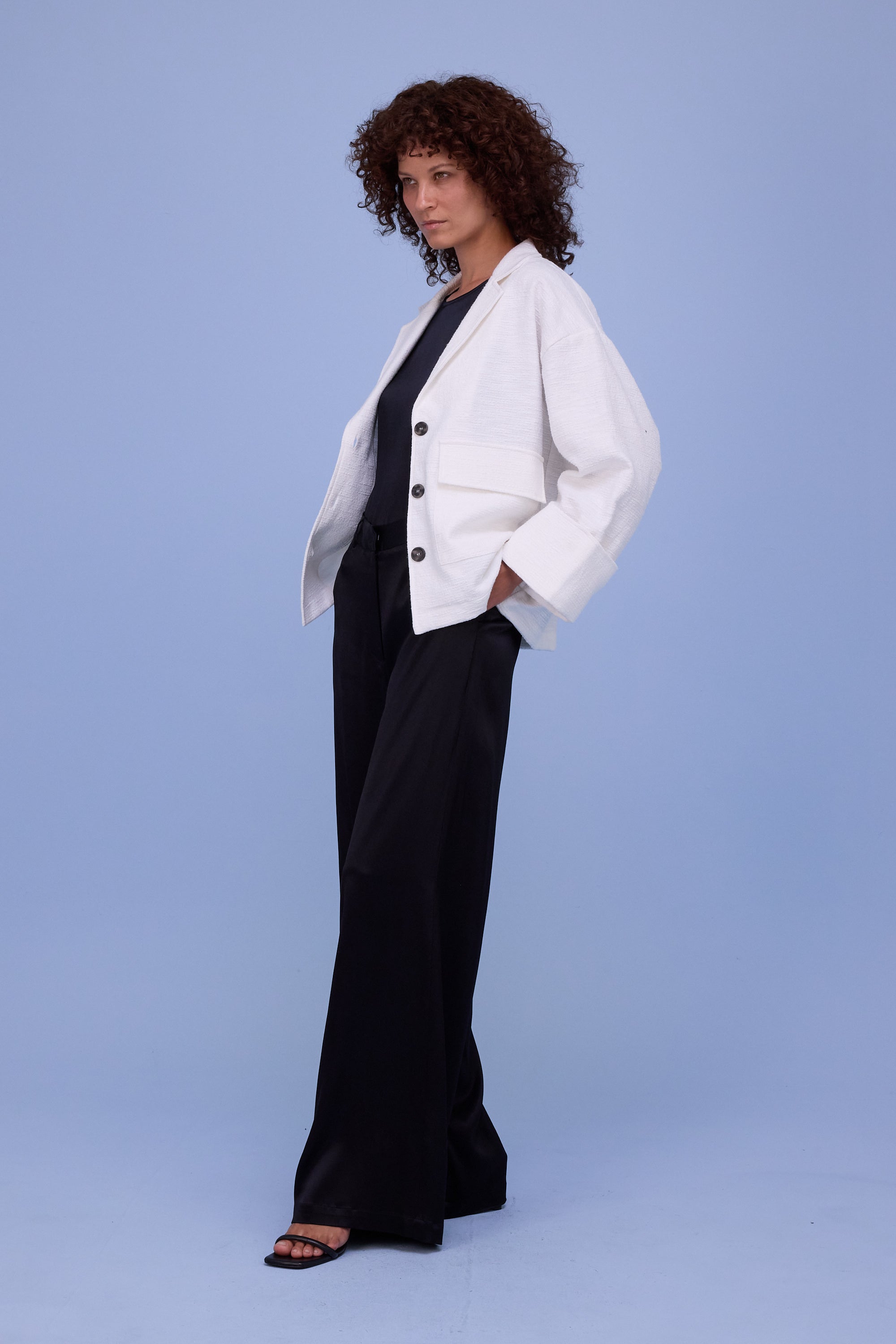 Helder jasje in witte tweedy cotton