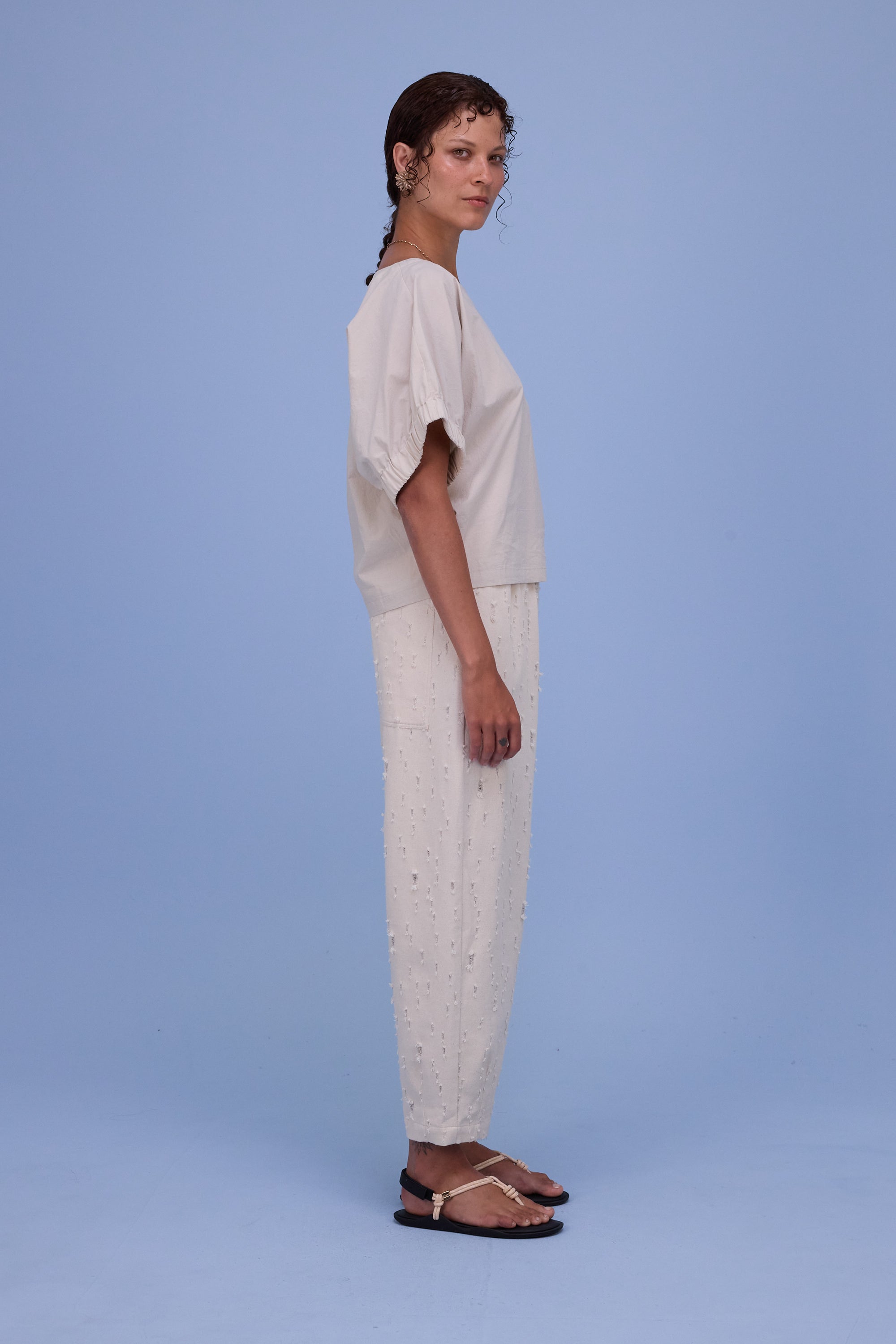 Hacene trousers in ecru ripped cotton