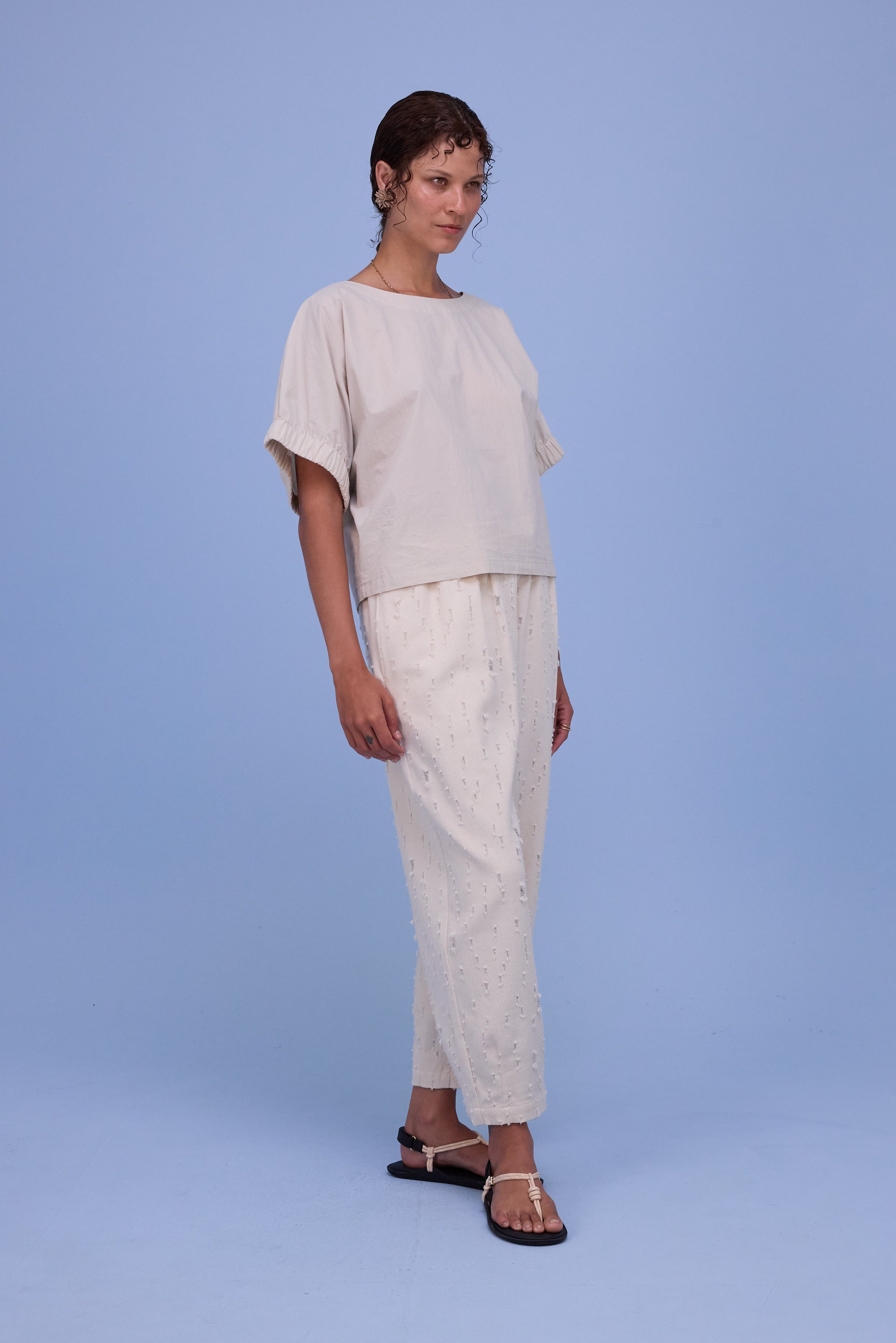 Hacene trousers in ecru ripped cotton