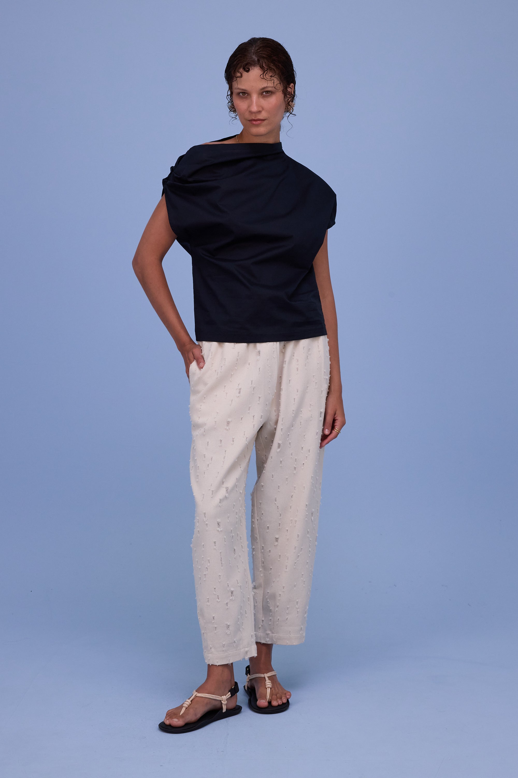 Hacene trousers in ecru ripped cotton