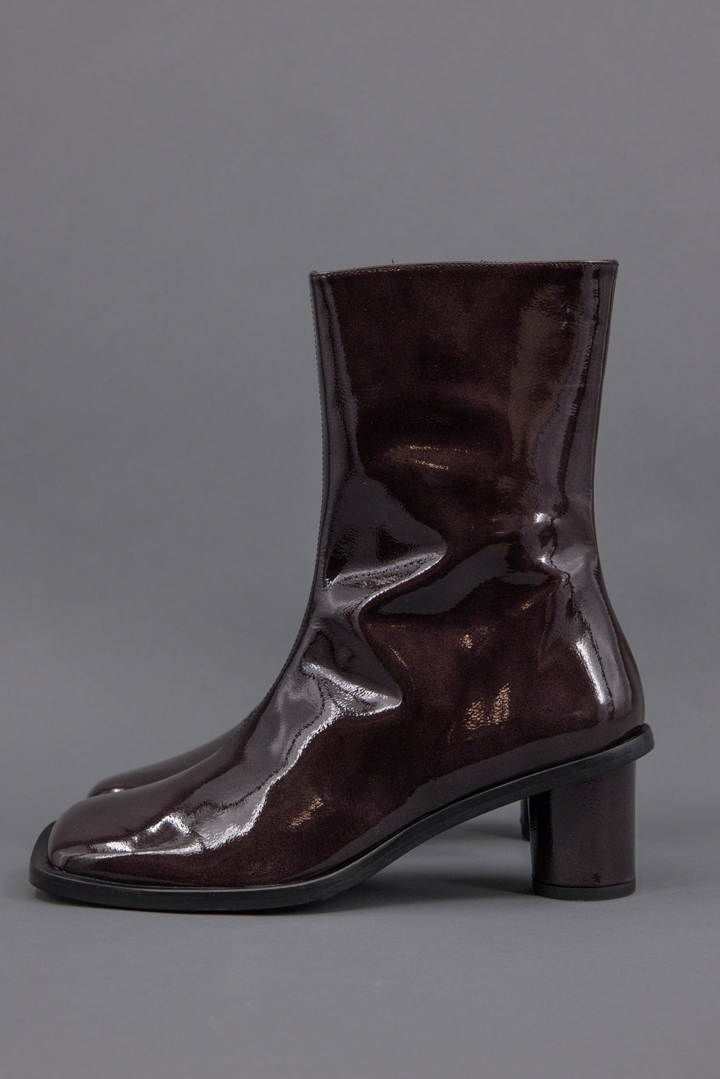 Grada ankle booth in patent after dark